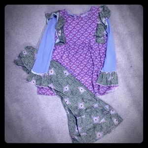 Flit and flitter cute in ruffles outfit